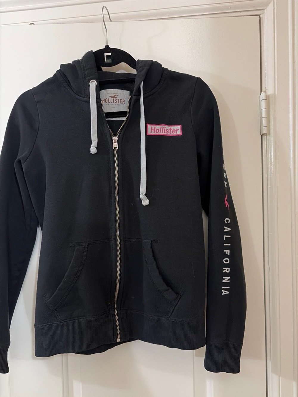 Hollister Black Zip Hoodie with Pink Logo Patch